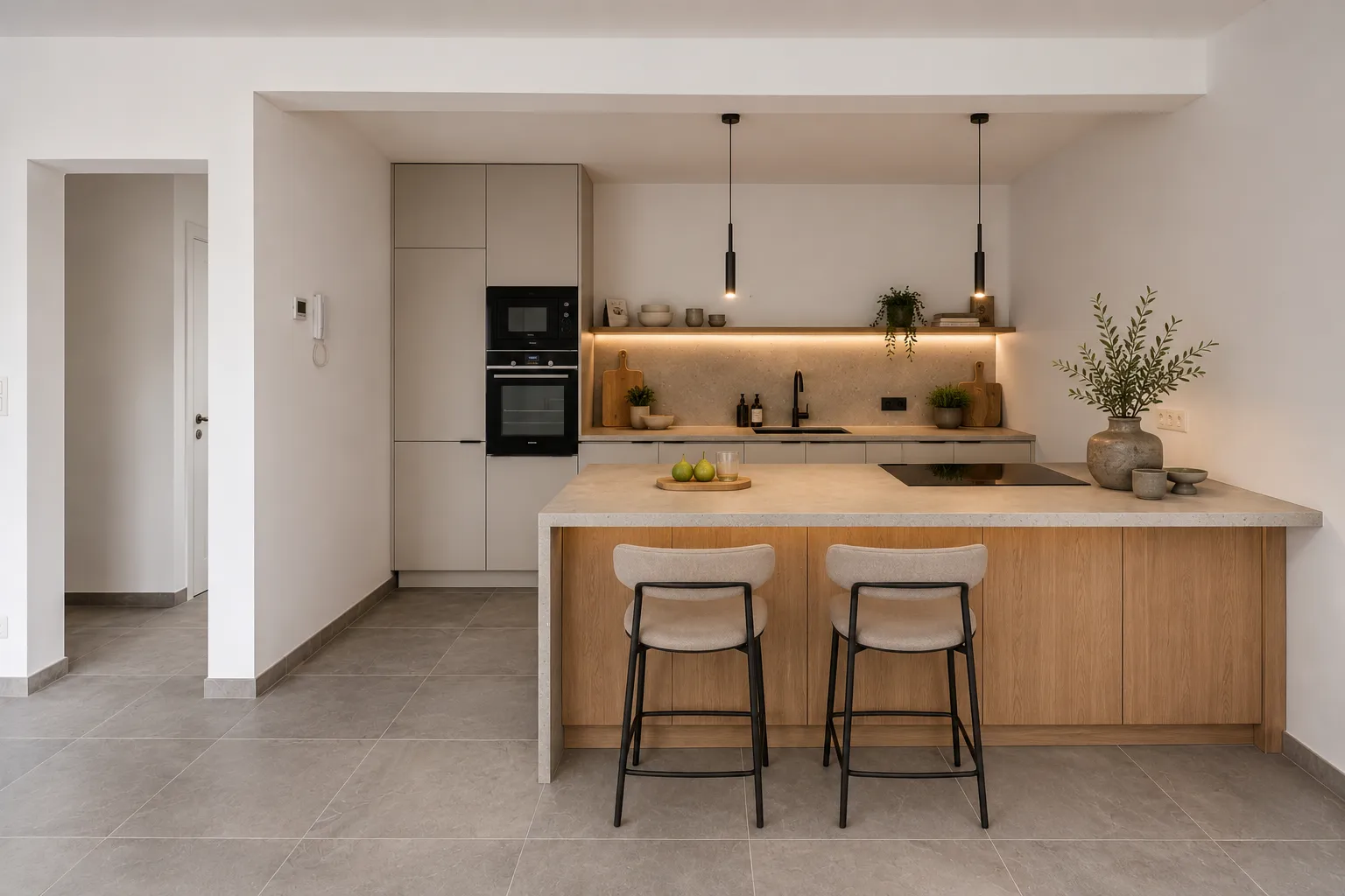 Impressie van de open keuken met kookeiland en barkrukken — stijl 1