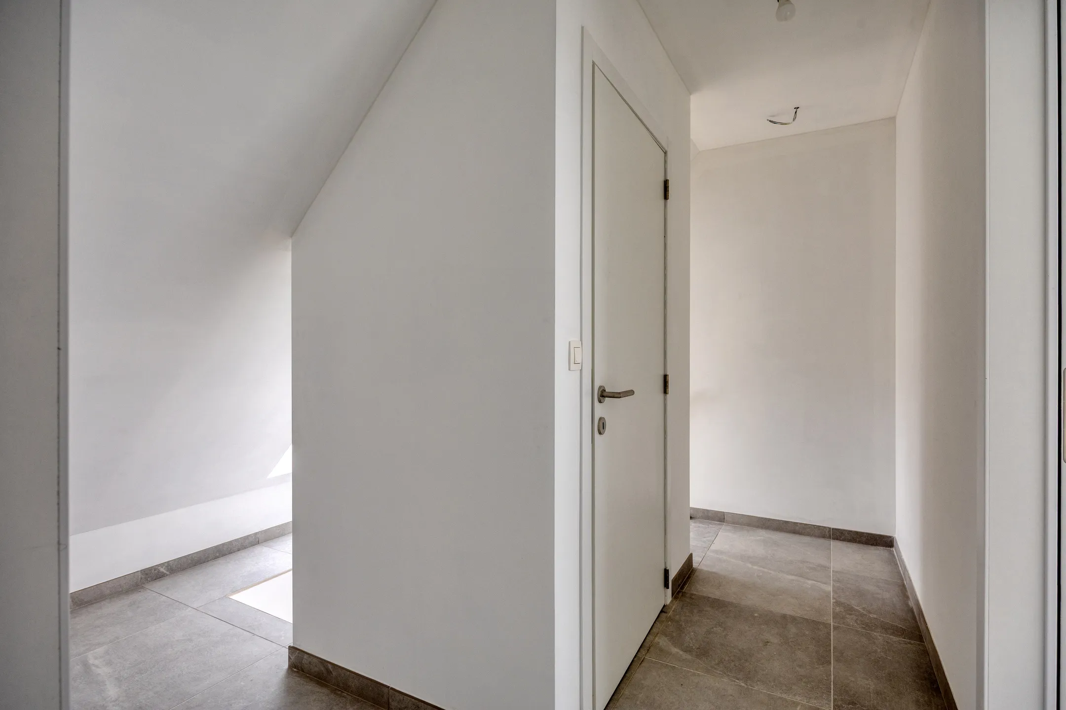 Overloop met schuin plafond