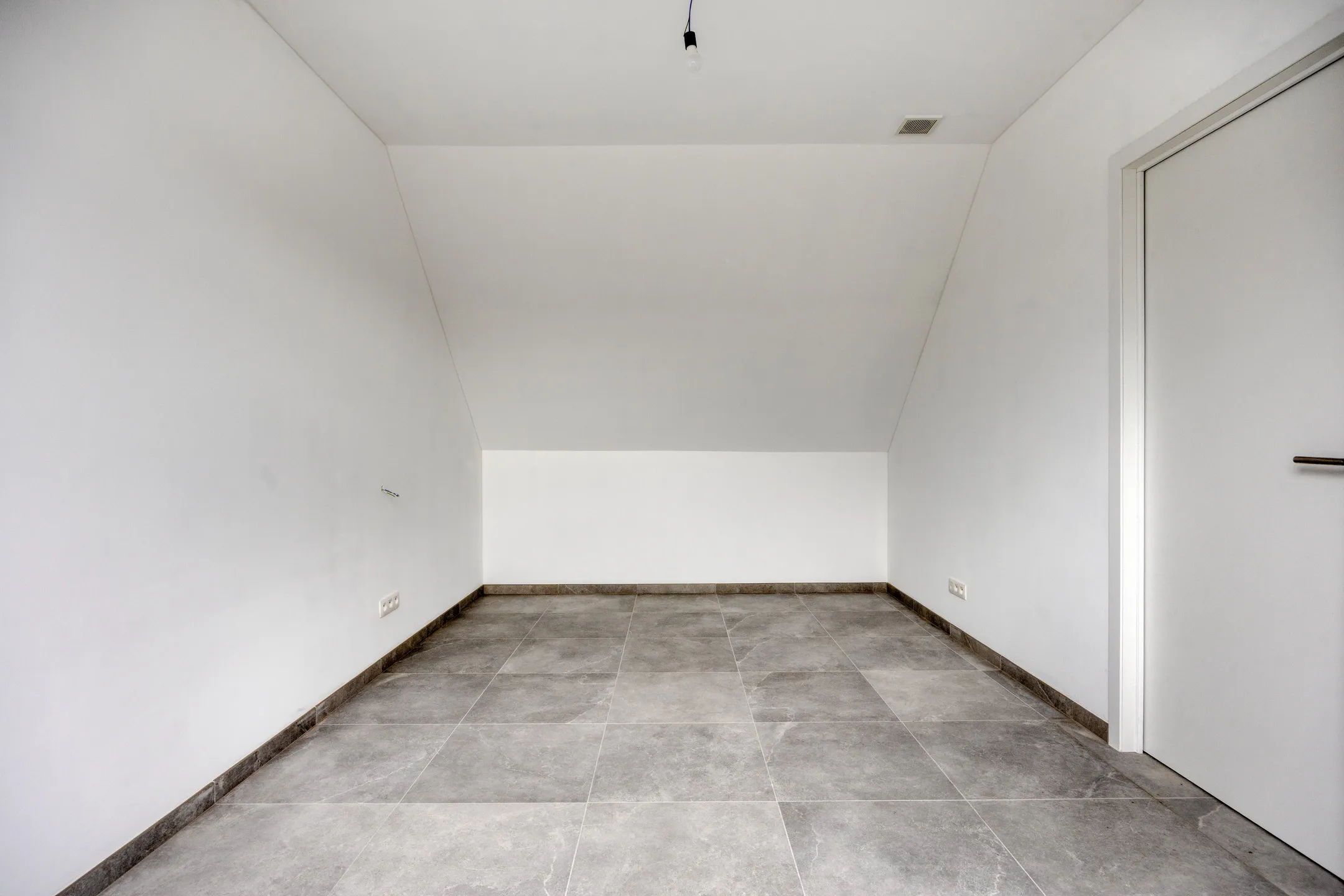 Slaapkamer met schuin dak